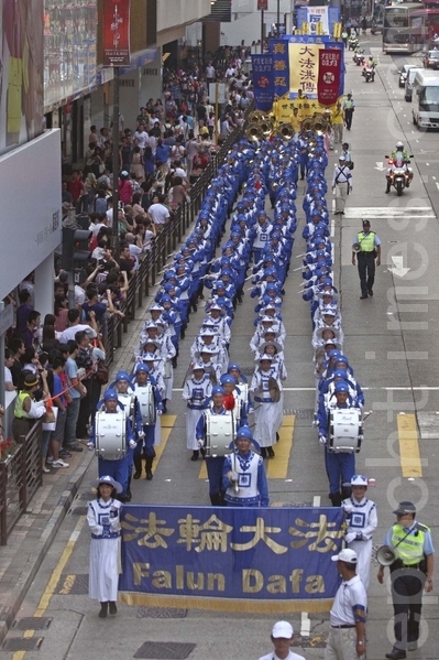 2012年的5月13日是第13届世界法轮大法日，也是法轮大法洪传20周年纪念日。香港举行集会游行。（摄影：潘在殊/大纪元）