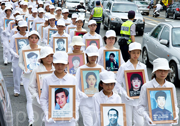 2012年7月21日，台灣法輪功學員於台中市舉行720反迫害遊行。（攝影：陳柏州 / 大紀元）