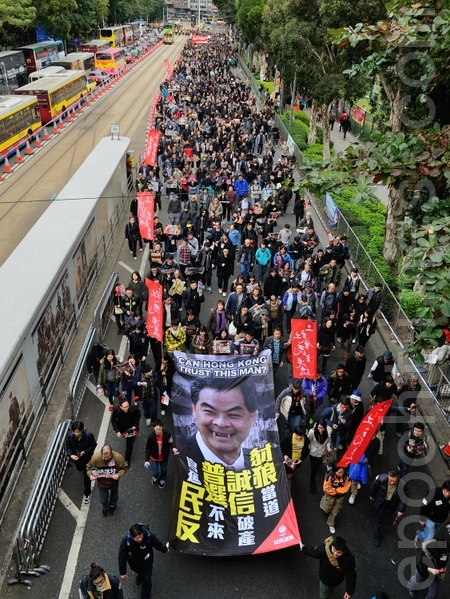 香港多个民间团体兵分多路出发游行抗议，反对中共干预港人治港，并要求特首梁振英下台。（摄影：宋祥龙/大纪元）
