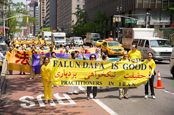 5月14日，四千名来自全球的部分法轮功学员，在纽约曼哈顿中城联合国附近游行，敦促联合国制止中共行恶。（戴兵/大纪元）