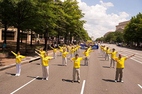 2014年7月17日美国首都华盛顿DC法轮功十五年和平反迫害集会游行（戴兵／大纪元）