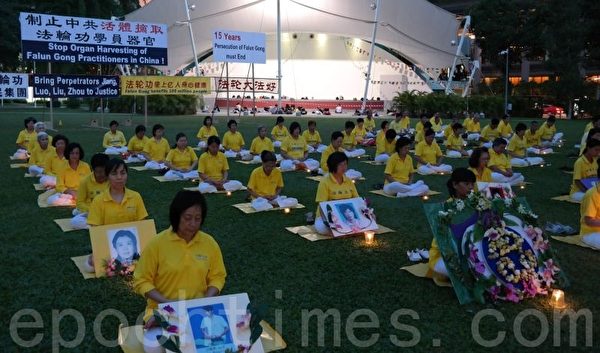 新加坡法輪功學員舉行燭光悼念活動，緬懷被中共迫害致死的大陸同修。