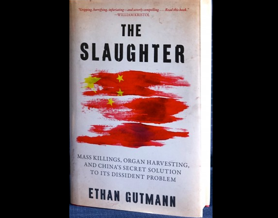 伊森•葛特曼（Ethan Gutmann），2014年8月發表的英文版《大屠殺：大規模屠殺，活摘器官，中共對異議人士的秘密解決方式》(Pam McLennan/大紀元)