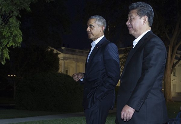 2015年9月24日，華盛頓DC，美國總統奧巴馬和中共國家主席習近平一起前往國賓館布萊爾宮（Blair House）。(MANDEL NGAN/AFP/Getty Images)