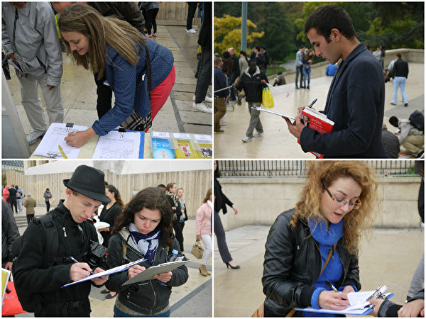 世界各地游客和法国民众认真签名，表达支持法轮功反迫害的心声。（明慧网）