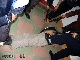 2010-7-15-minghui-persecution-electric-batons--ss
