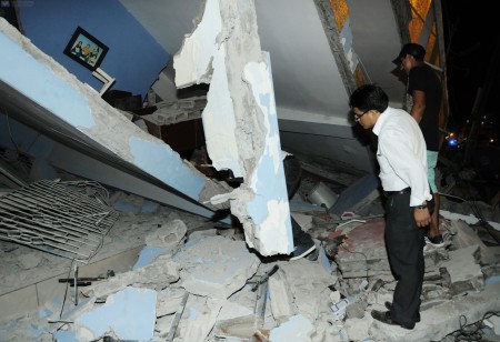 倒塌的房屋。（AFP/Getty Images)