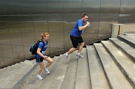 SYDNEY, AUSTRALIA - NOVEMBER 20: A team runs up a staircase during the 2010 Urban Max Series adventure race in the city on November 20, 2010 in Sydney, Australia. Participants competed in pairs of two and were challenged to reach predetermined checkpoints by solving riddles using only using only a mobile phone, map and cue sheet. Contestants could walk, run or take public transport but the use of cars, bikes or taxis meant instant disqualification. (Photo by Cameron Spencer/Getty Images)