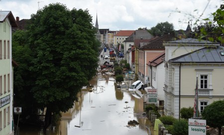 This picture shows an overview of a flooded area in Simbach am Inn, southern Germany, on June 2, 2016. Four bodies were found floating in homes in France and Germany Wednesday in flash floods that left water lapping at the doors of one of the Loire Valley's most famous chateaux. Heavy rains lashing parts of France, Germany and Austria cut roads, stranded people on rooftops and forced schools to close their doors, and French weather forecasters warned of more to come on June 2, 2016. / AFP / Christof Stache (Photo credit should read CHRISTOF STACHE/AFP/Getty Images)