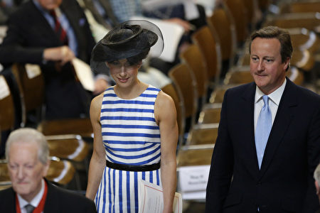British Prime Minister David Cameron (R) and his wife Samantha (L) leave at the end of a national service of thanksgiving for the 90th birthday of Britain's Queen Elizabeth II at St Paul's Cathedral in London on June 10, 2016, which is also the Duke of Edinburgh's 95th birthday. Britain started a weekend of events to celebrate the Queen's 90th birthday. The Queen and the Duke of Edinburgh along with other members of the royal family will attend a national service of thanksgiving at St Paul's Cathedral on June 10, which is also the Duke of Edinburgh's 95th birthday. / AFP / POOL / Matt Dunham (Photo credit should read MATT DUNHAM/AFP/Getty Images)