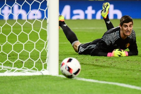 Belgium's goalkeeper Thibaut Courtois reacts as he dives for the ball during the Euro 2016 round of 16 football match between Hungary and Belgium at the Stadium Municipal in Toulouse on June 26, 2016. / AFP / ATTILA KISBENEDEK (Photo credit should read ATTILA KISBENEDEK/AFP/Getty Images)