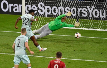 Belgium's forward Michy Batshuayi (L) scores past Hungary's goalkeeper Gabor Kiraly during the Euro 2016 round of 16 football match between Hungary and Belgium at the Stadium Municipal in Toulouse on June 26, 2016. / AFP / Pascal PAVANI (Photo credit should read PASCAL PAVANI/AFP/Getty Images)