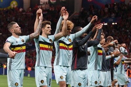 Belgium's players celebrate after winning the Euro 2016 round of 16 football match between Hungary and Belgium at the Stadium Municipal in Toulouse on June 26, 2016. / AFP / PASCAL GUYOT (Photo credit should read PASCAL GUYOT/AFP/Getty Images)