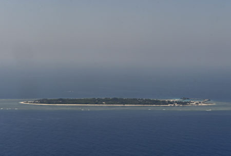 南海仲裁結果今天公布，國安高層密切關注，多次沙盤推演相關因應作為。圖為太平島。（AFP）