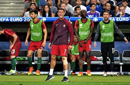 PARIS, FRANCE - JULY 10: Cristiano Ronaldo of Portugal reacts during the UEFA EURO 2016 Final match between Portugal and France at Stade de France on July 10, 2016 in Paris, France. (Photo by Michael Regan/Getty Images)