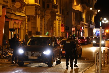 Police officers carry out checks on vehicles in the centre of French Riviera town of Nice, after a van drove into a crowd watching a fireworks display on July 14, 2016. At least 60 people are feared dead after a van drove into a crowd watching Bastille Day fireworks in the French resort of Nice on July 14, authorities said on July 15. / AFP / Valery HACHE (Photo credit should read VALERY HACHE/AFP/Getty Images)
