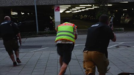 MUNICH, GERMANY - JULY 22: Police officers respond to the shooting at the Olympia Einkaufzentrum (OEZ) at July 22, 2016 in Munich, Germany. According to reports, several people have been killed and an unknown number injured in a shooting at a shopping centre in the north-western Moosach district in Munich. Police are hunting the attacker or attackers who are thought to be still at large. (Photo by Marc Mueller/Getty Images)