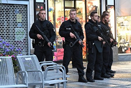 Police secures the area naer Stachus square following shooting earlier at a shooping mall on July 22, 2016 in Munich. Several people were killed on Friday in a shooting rampage by a lone gunman in a Munich shopping centre, media reports said / AFP / dpa / Sven Hoppe / Germany OUT (Photo credit should read SVEN HOPPE/AFP/Getty Images)