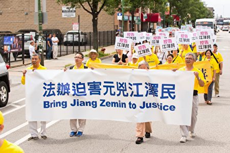 2016年7月30日，来自中部十个州的法轮功学员汇集在芝加哥中国城举行盛大的游行。（陈虎/大纪元）