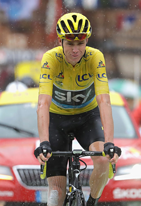 MEGEVE, FRANCE - JULY 23: Chris Froome of Great Britain and Team Sky (yellow jersey) looks on in the rain as he finished stage twenty of the 2016 Le Tour de France, from Megeve to Morzine on July 23, 2016 in Megeve, France. (Photo by Chris Graythen/Getty Images)