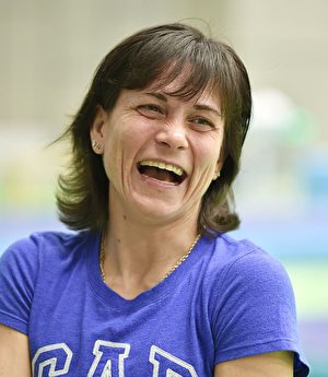 “邱妈”第七次参加奥运会，堪称奇迹。 (KAZUHIRO NOGI/AFP/Getty Images)