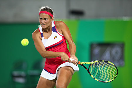 里约奥运网球赛结束了女单冠军的争夺，世界排名34位的波多黎各选手普伊格夺得金牌。(Clive Brunskill/Getty Images)