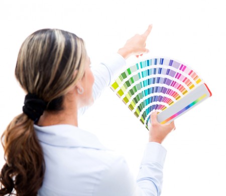 Woman choosing a color for the wall