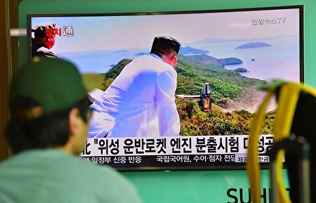 A man watches a television news report showing North Korean leader Kim Jong-Un looking at the country's latest ground test for a rocket engine, at a railway station in Seoul on September 20, 2016. North Korea has successfully tested a new, high-powered rocket engine, state media said on September 20, a move experts say will bolster its already burgeoning weapons programme. / AFP / JUNG YEON-JE (Photo credit should read JUNG YEON-JE/AFP/Getty Images)