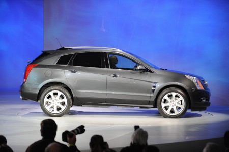 The Cadillac SRX rolls out during a press preview at the North American International Auto Show January 11, 2009 in Detroit, Michigan. AFP PHOTO/Stan HONDAWith sales tanking and General Motors and Chrysler struggling for their very survival, the Detroit auto show promises to be a subdued and tense affair as automakers launch new models to compete for an ever-dwindling number of customers. Some 58 new models -- including 44 worldwide debuts -- will be introduced in the coming days as the manufacturers vie for the attention of nearly 7,000 journalists from over 60 countries at press previews. AFP PHOTO/Stan HONDA (Photo credit should read STAN HONDA/AFP/Getty Images)