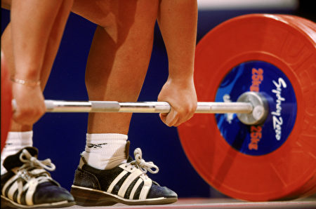 SYDNEY - SEPTEMBER 22: A general view of a lifter during the Women's 75+kg weight lifting finals at the Sydney Convention Centre during the Sydney Olympic Games in Sydney, Australia on September 22, 2000. (Photo by Doug Pensinger /Getty Images)