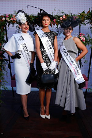 MELBOURNE, AUSTRALIA - OCTOBER 29: Myer Fashions on the Field Women's Racewear competition winner Gunita Kenina (C) and Runners Up Stacey Hanley and Tanya Lazarou pose in the Myer Fashion On The Field Marquee on Victoria Derby Day at Flemington Racecourse on October 29, 2016 in Melbourne, Australia. (Photo by Daniel Pockett/Getty Images for the VRC)