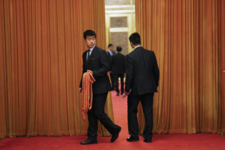 BEIJING, CHINA - APRIL 28: A security agent holds a rope outside a room where China's President Xi Jinping meets Russian Foreign Minister Sergey Lavrov at the Great Hall of the People on April 28, 2016 in Beijing, China. (Photo by Damir Sagolj - Pool/Getty Images)