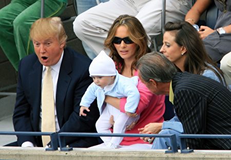 NEW YORK - SEPTEMBER 10: Donald Trump, baby son Barron and wife Melania Trump watch the men's final between Roger Federer of Switzerland and Andy Roddick during the U.S. Open at the USTA Billie Jean King National Tennis Center in Flushing Meadows Corona Park on September 10, 2006 in the Flushing neighborhood of the Queens borough of New York City. (Photo by Jamie Squire/Getty Images)
