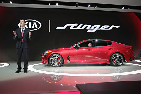 DETROIT, MI - JANUARY 09: Michael Sprague, Chief Operating Officer Kia Motors America, introduces the 2018 Stinger at the North American International Auto Show (NAIAS) on January 9, 2017 in Detroit, Michigan. The show is open to the public from January 14-22. (Photo by Scott Olson/Getty Images)