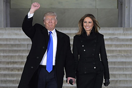 US President-elect Donald Trump and his wife Melania arrive to attend an inauguration concert at the Lincoln Memorial in Washington, DC, on January 19, 2017. / AFP / MANDEL NGAN (Photo credit should read MANDEL NGAN/AFP/Getty Images)