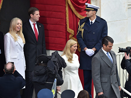 L-R: Tiffany Trump, Eric Trump, Ivanka Trump and Donald Trump Jr., arrive on the platform of the US Capitol in Washington, DC, on January 20, 2017, before the swearing-in ceremony of US President-elect Donald Trump. / AFP / Paul J. Richards (Photo credit should read PAUL J. RICHARDS/AFP/Getty Images)