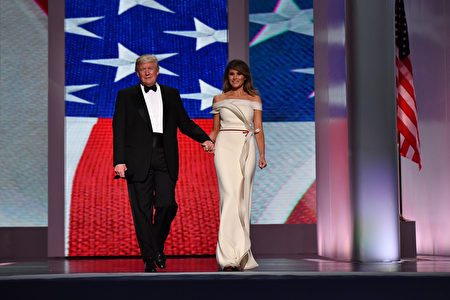 WASHINGTON, DC - JANUARY 20: President Donald Trump and First Lady Melania Trump arrive at the Freedom Ball on January 20, 2017 in Washington, D.C. Trump will attend a series of balls to cap his Inauguration day. (Photo by Kevin Dietsch - Pool/Getty Images)